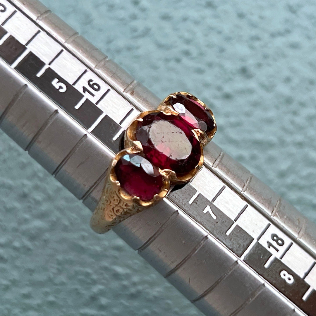 Detailed view of antique three stone setting