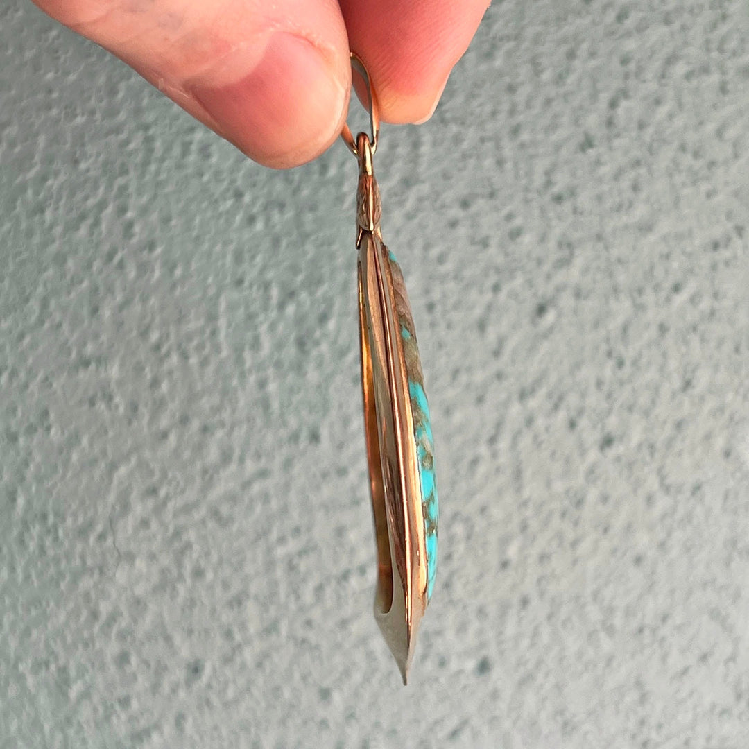 Side profile of Victorian turquoise pendant