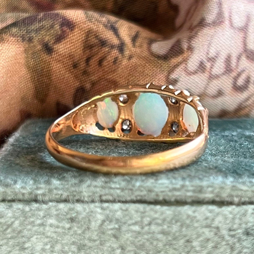 Victorian opal diamond ring angled view 18k gold