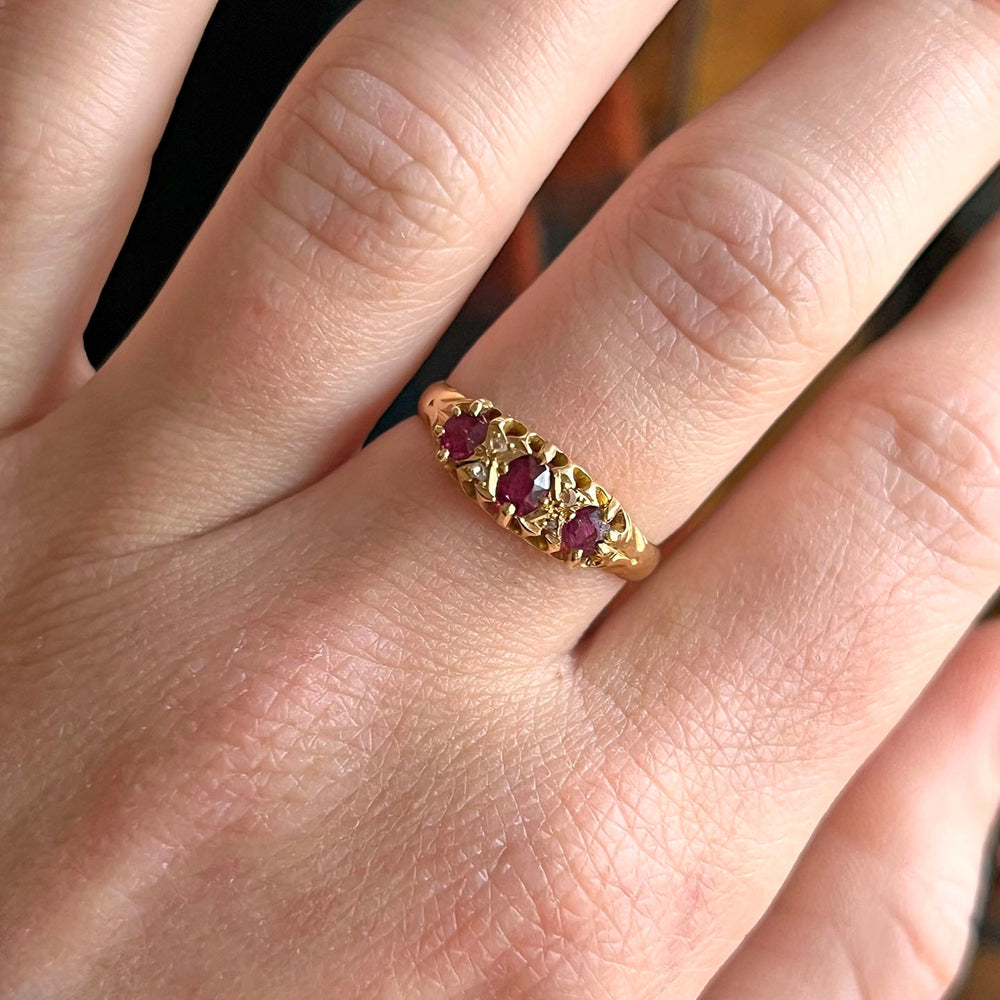 Antique ruby diamond ring on hand