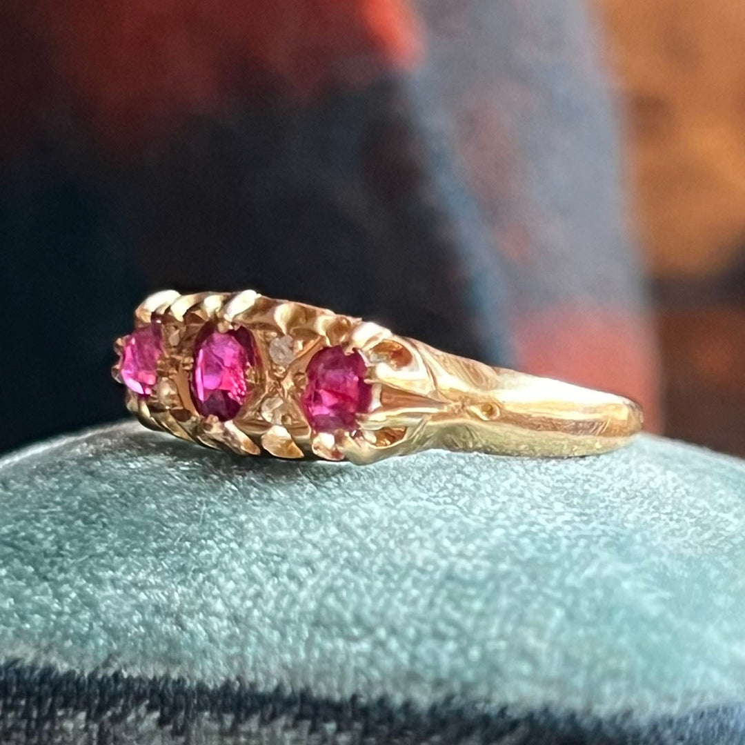 Vintage 1897 ruby diamond seven stone ring close up