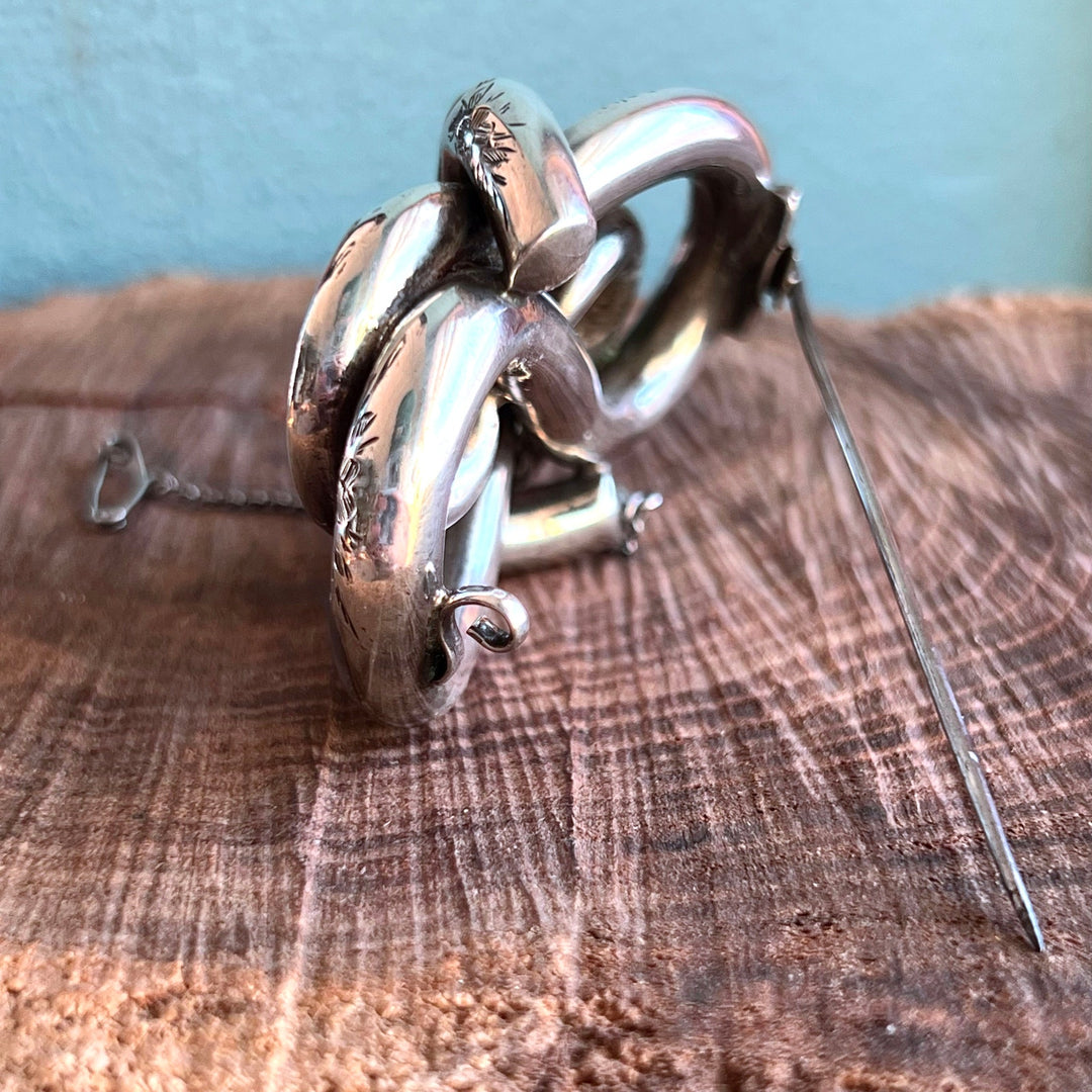 Side profile of Scottish silver brooch