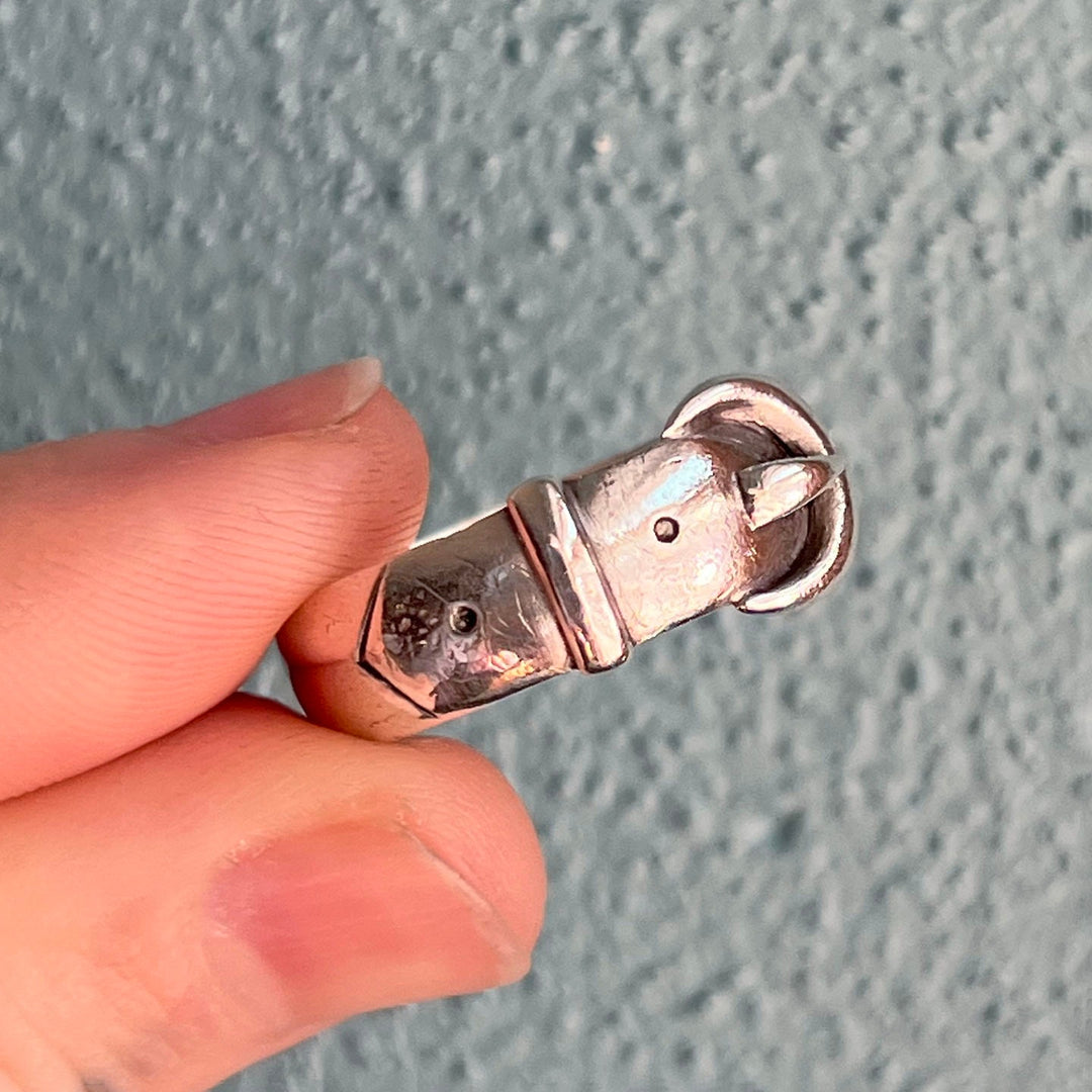 Detailed view of engraved silver design