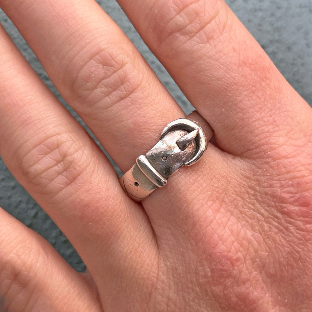 Detailed view of engraved silver design