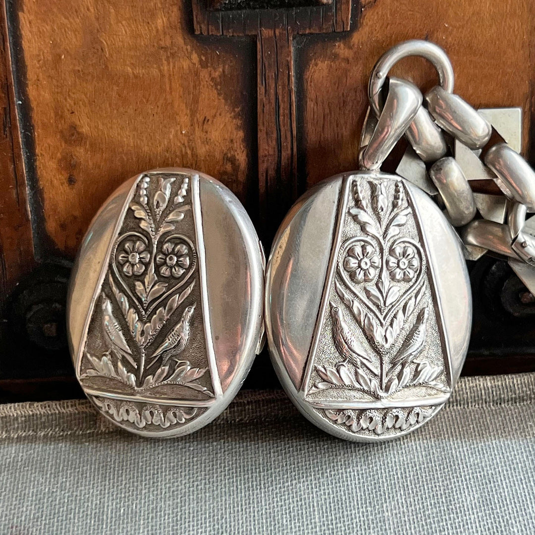 Close view of bird and floral repoussé detail