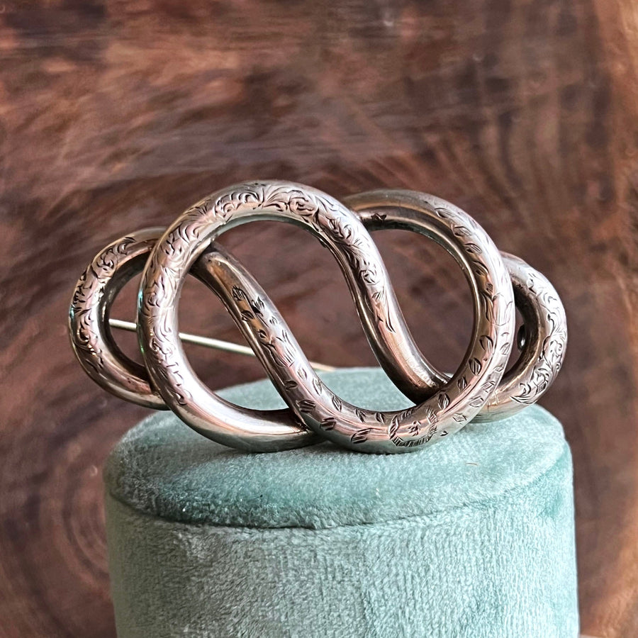 Antique Victorian silver engraved love knot brooch