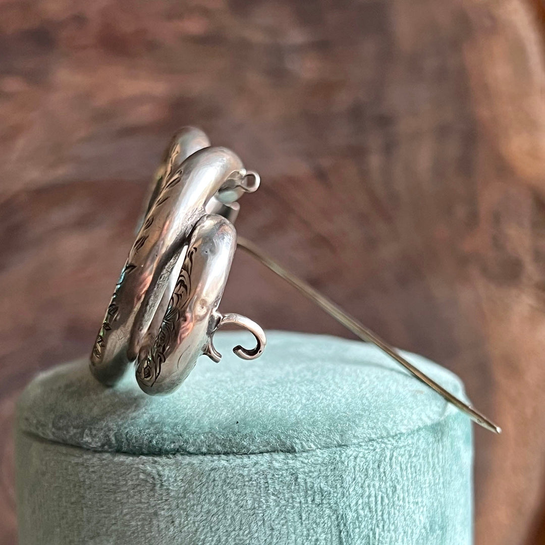 Side profile of Victorian silver brooch