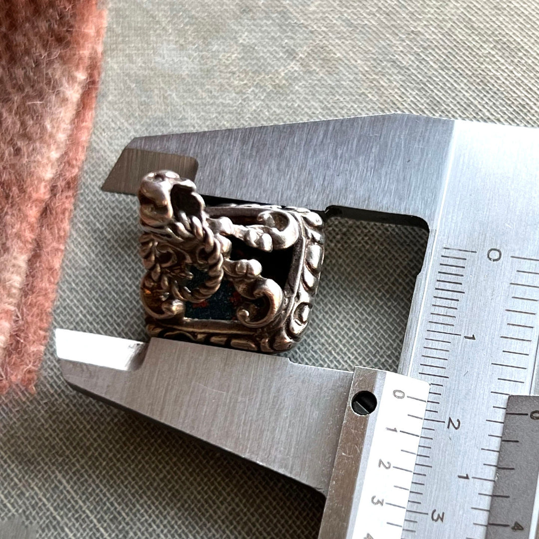 Detail of engraved silver fob setting with bloodstone