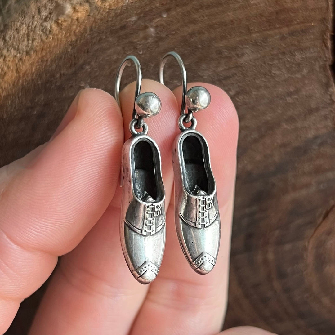 Antique silver earrings whimsical design