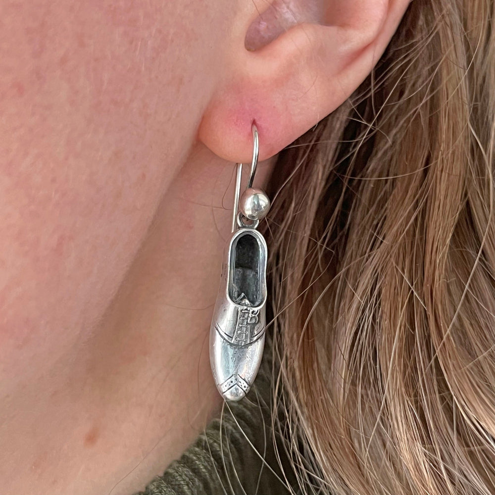 Victorian silver drop earrings with boot motifs