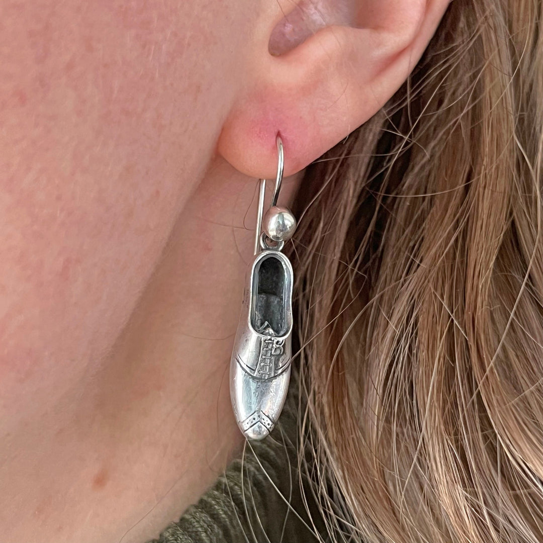Victorian silver drop earrings with boot motifs