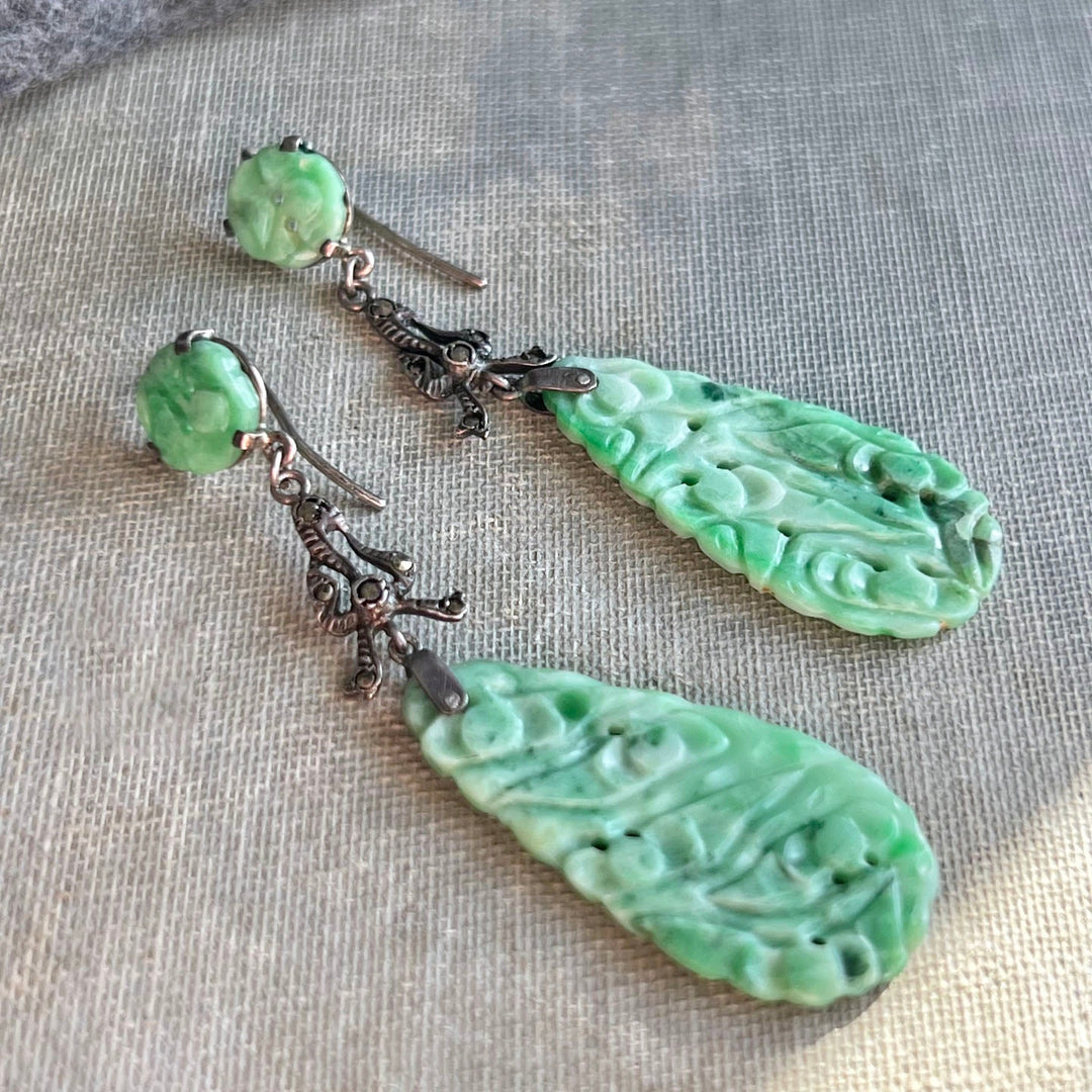 Close view of carved jade and marcasite details