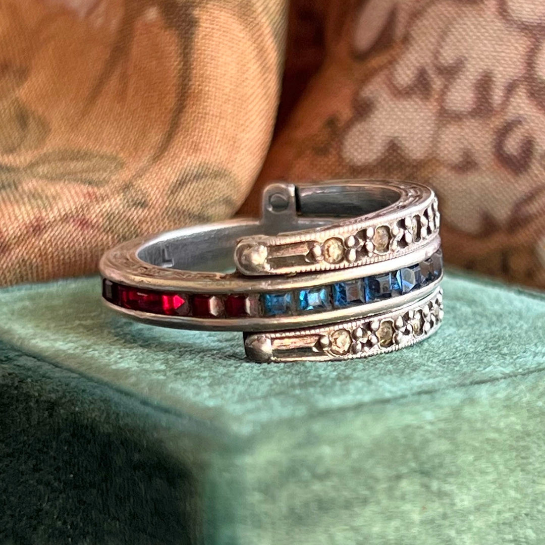 Vintage rotating flip ring with red blue and white paste stones
