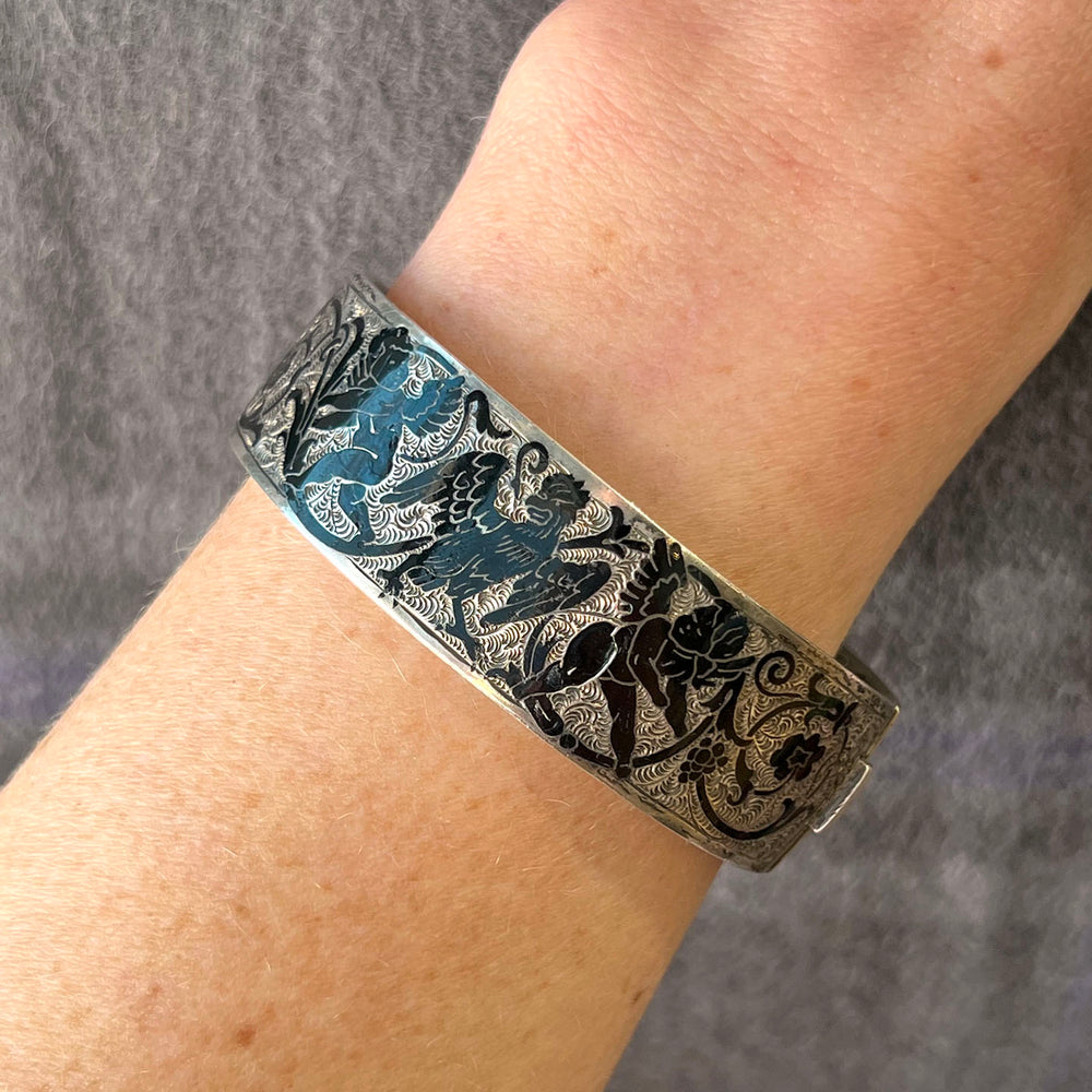 Antique Victorian Silver-Plated Bangle Black Enamel Griffin Cherub Motif, c. 1880