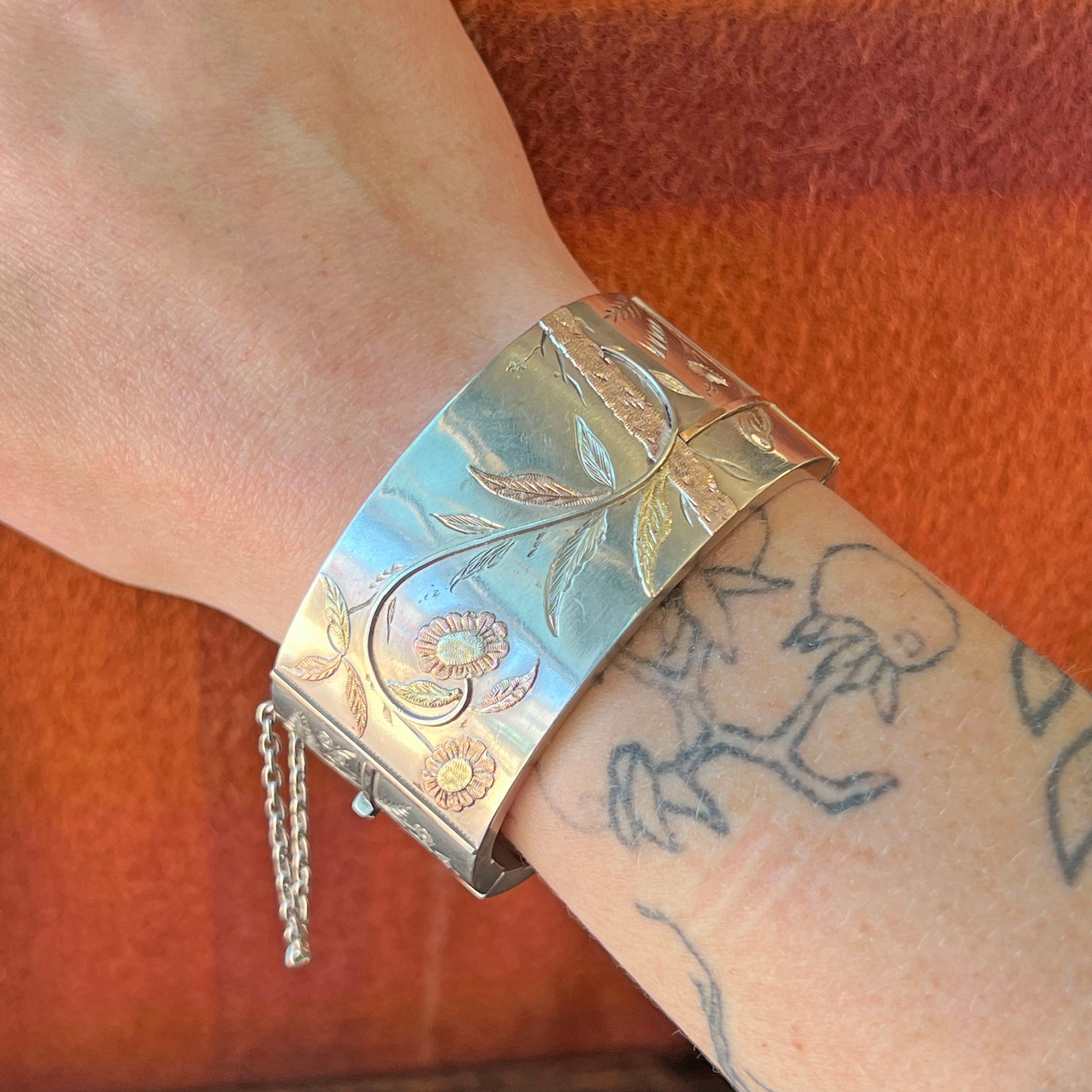 Antique Victorian Silver Aesthetic Bangle with Bird and Floral Motif, c. 1880