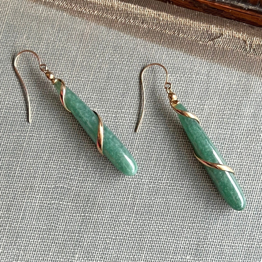 Side profile of antique jade drop earrings