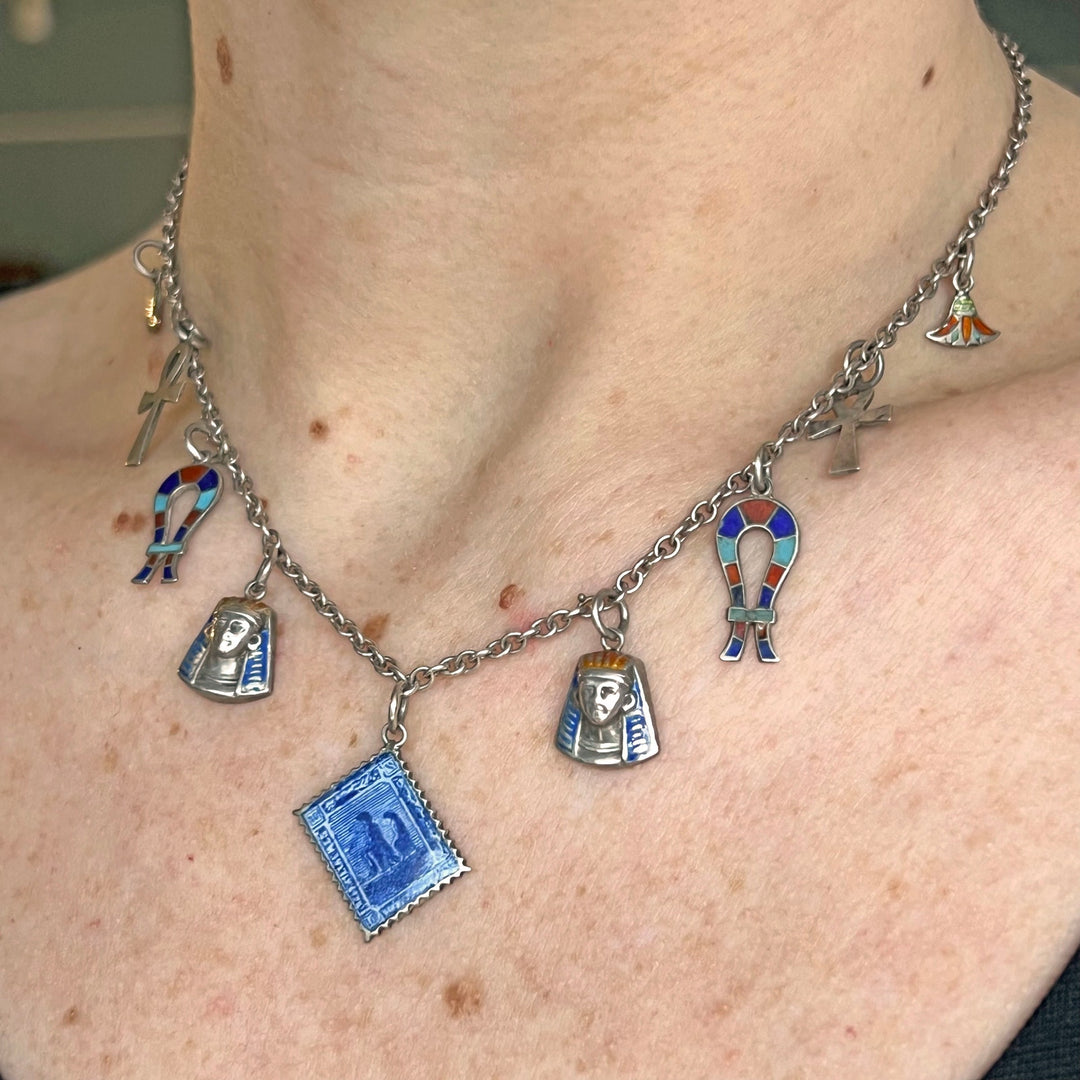 Side profile of vintage charm necklace