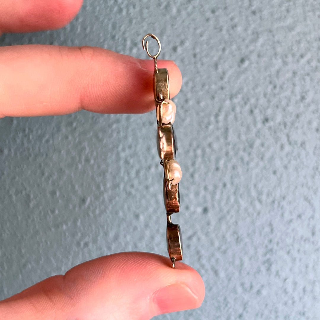 Georgian garnet and pearl religious pendant