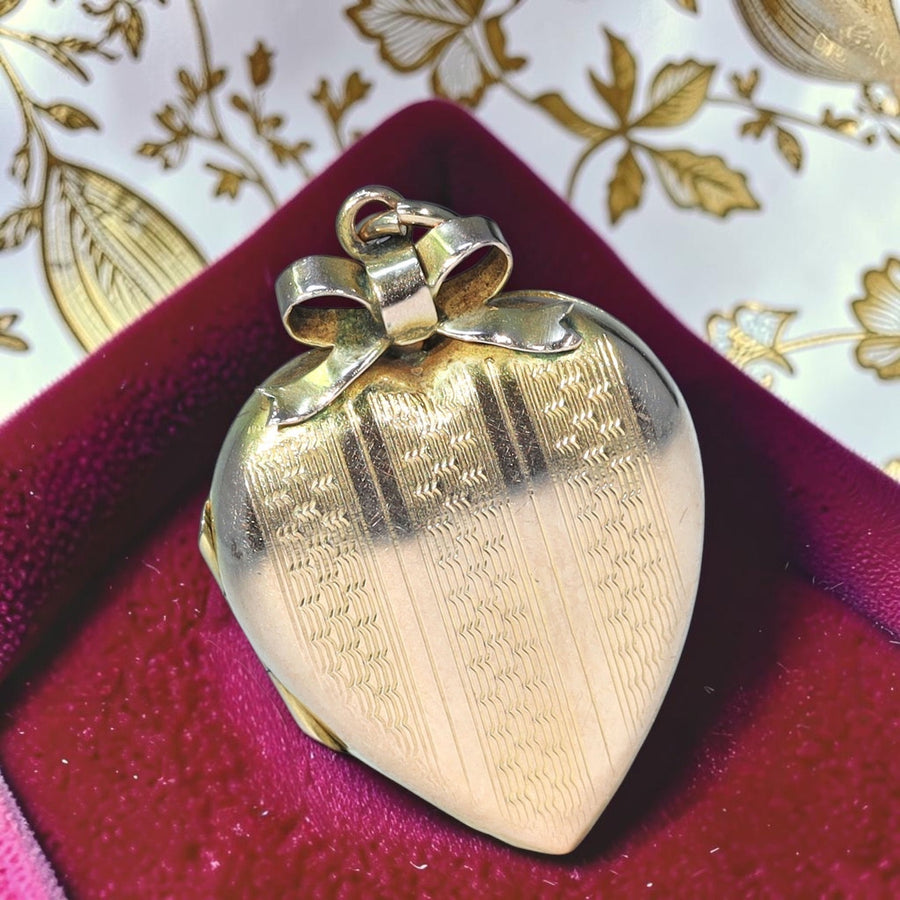 Antique Victorian gold heart bow engraved locket
