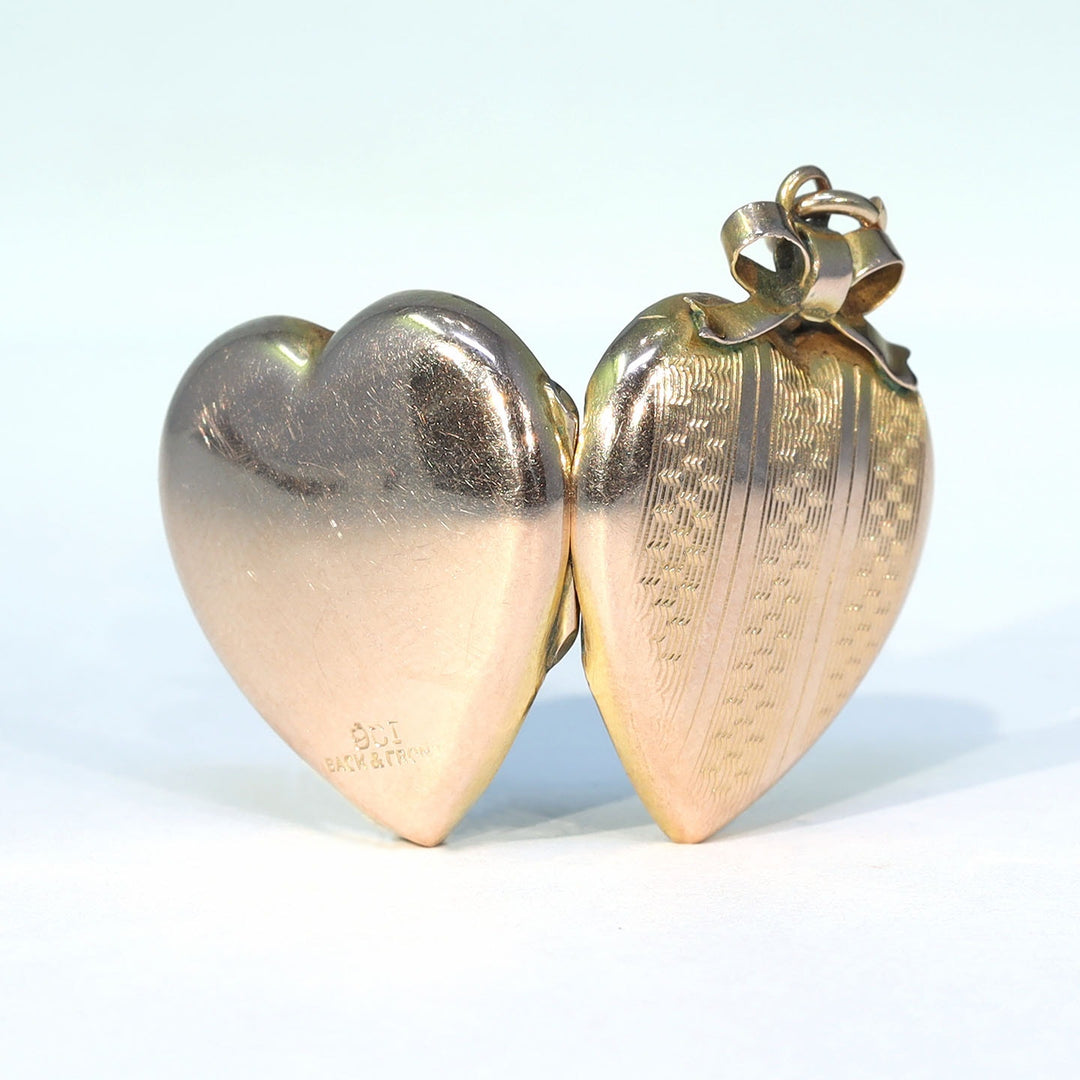 Engraved antique heart locket for photographs