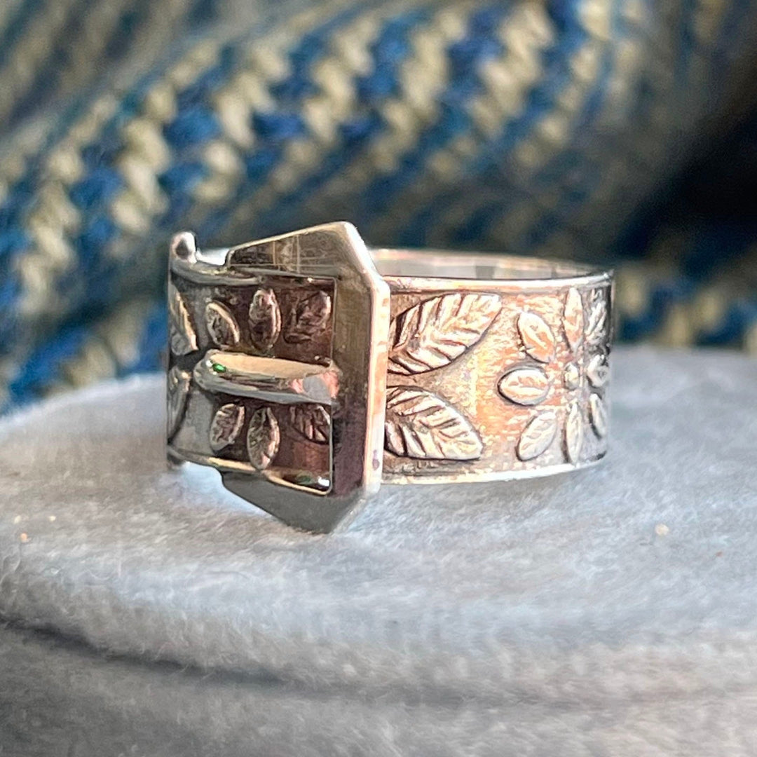 Detail of buckle motif on silver ring