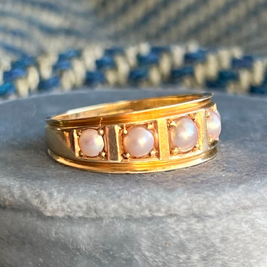 Close view of luminous pearl half hoop ring