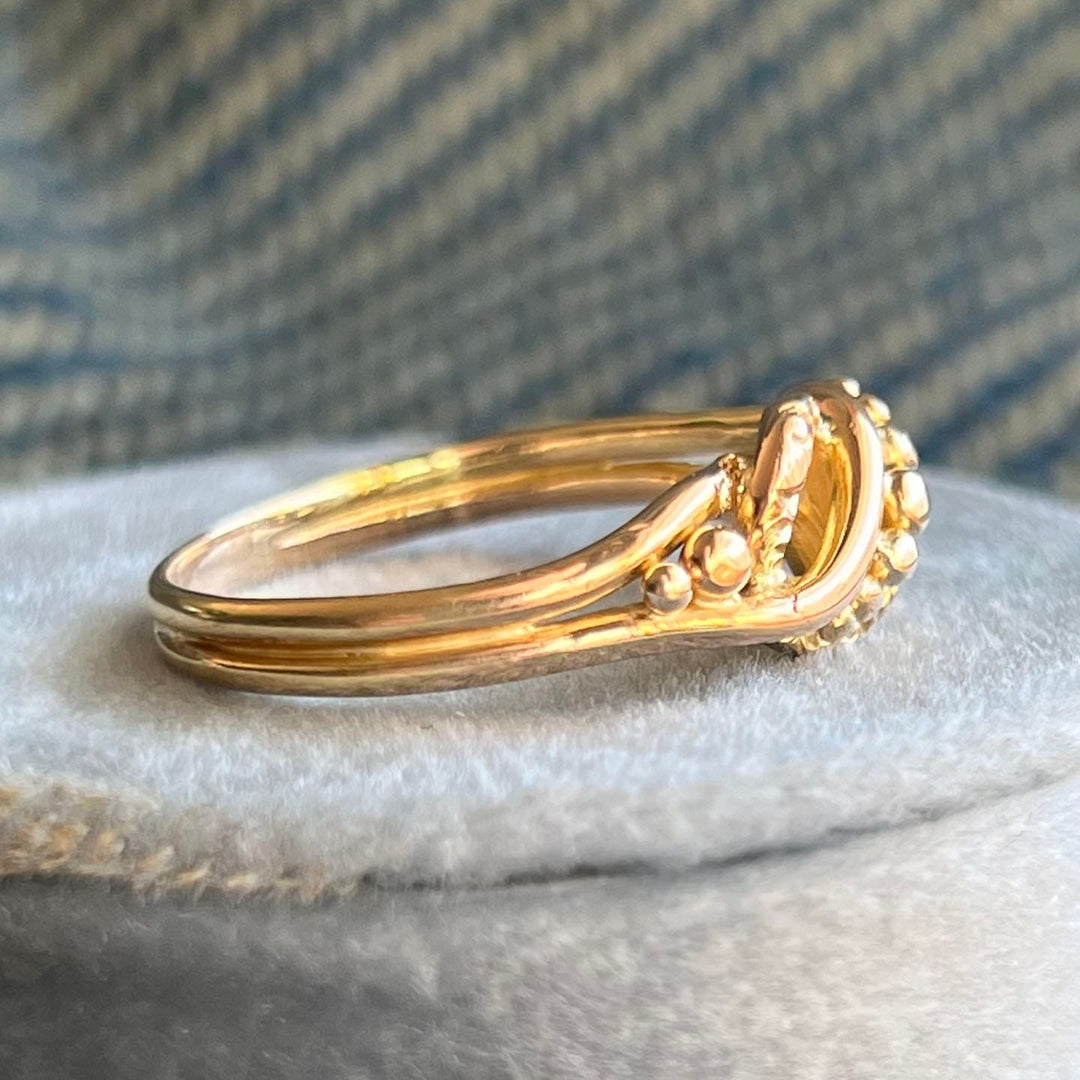 Side profile of antique gold knot ring