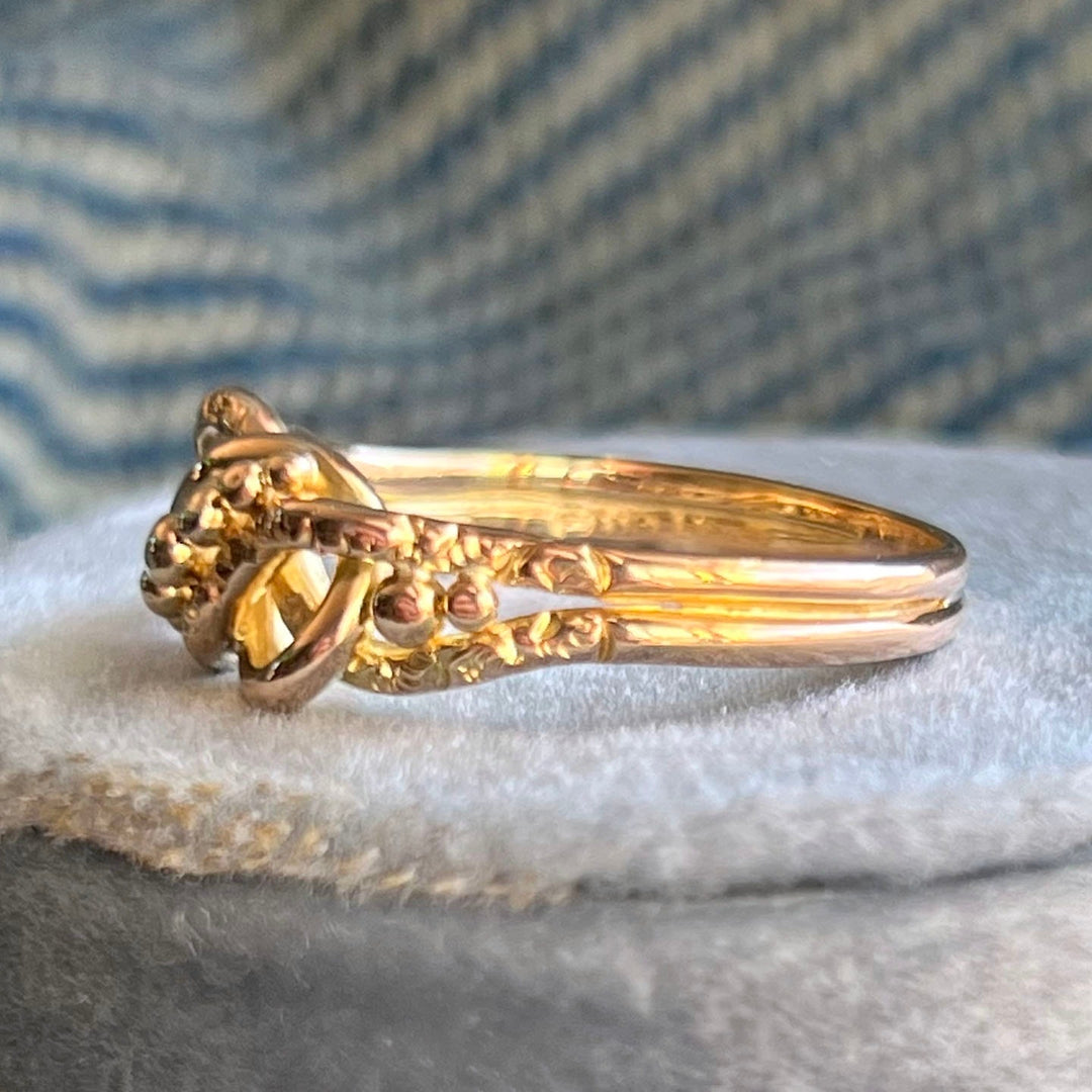 Side profile of antique gold knot ring