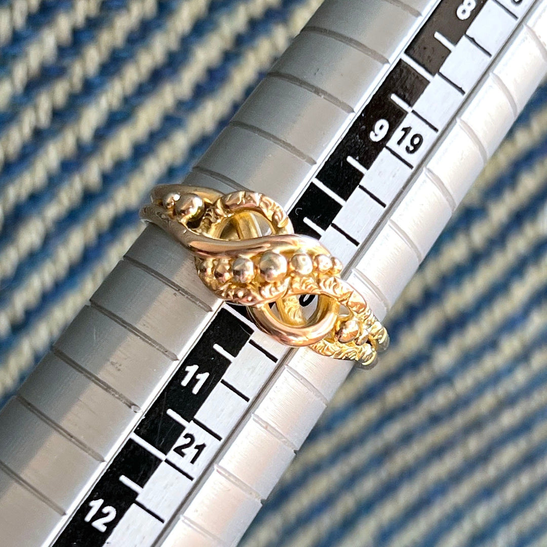 Elegant vintage gold love knot ring