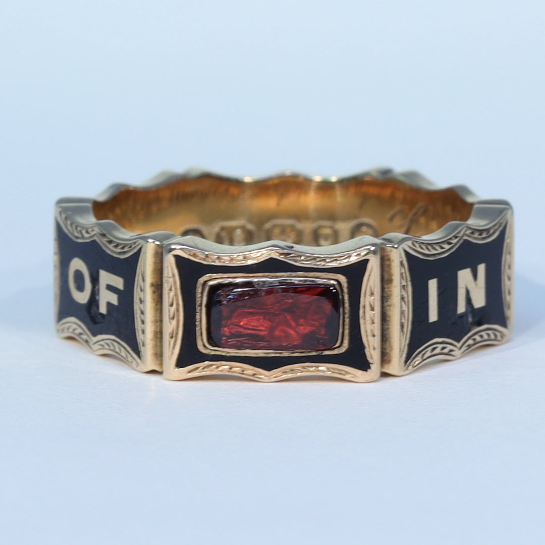 Victorian black enamel and garnet memorial ring dated 1869