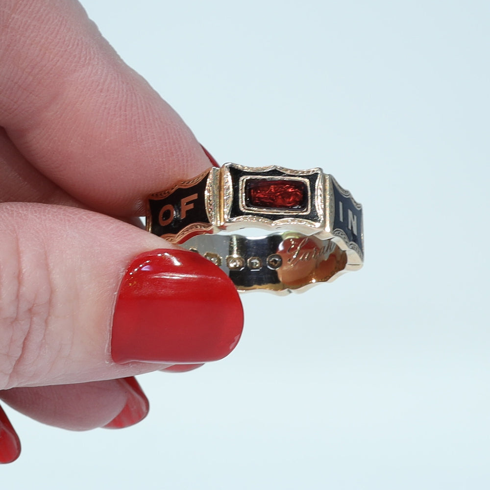 Victorian black enamel and garnet memorial ring dated 1869