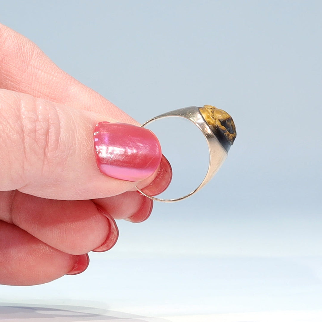 Victorian cameo ring with smooth gold bezel and tapering shoulders