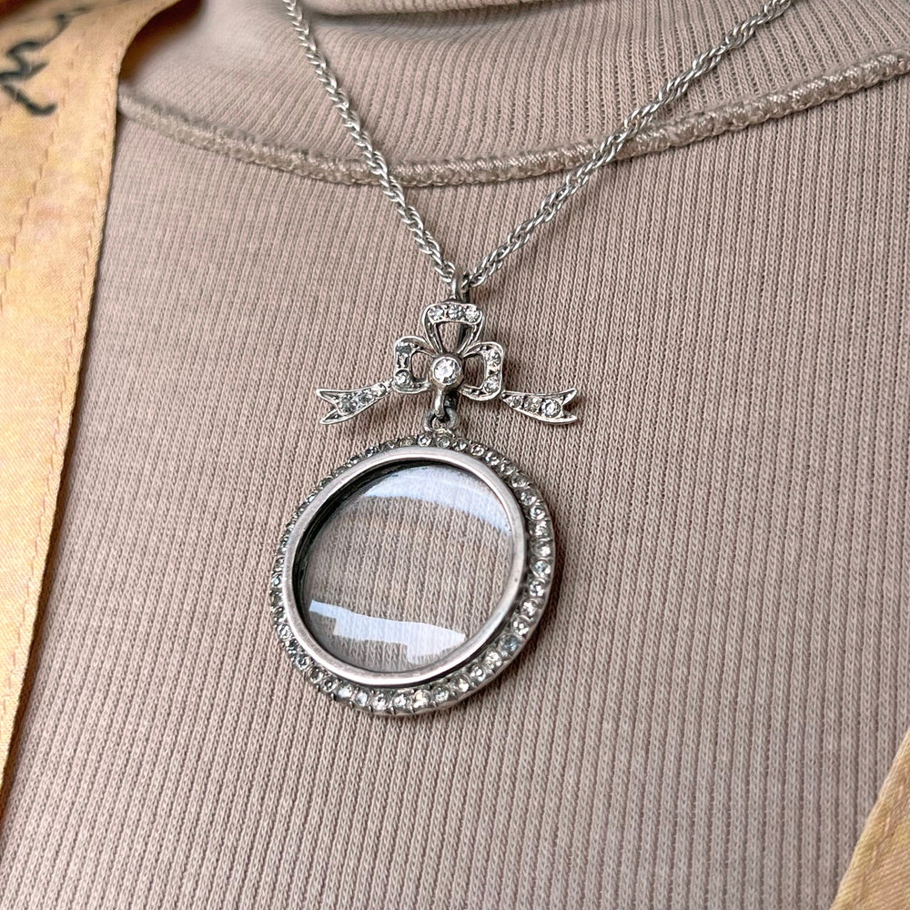 Antique silver bow locket pendant