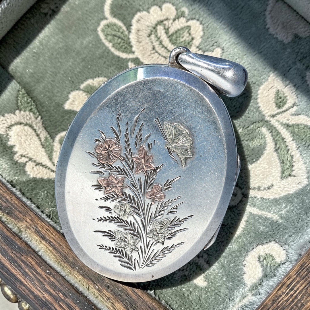 Antique Victorian silver butterfly floral engraved locket