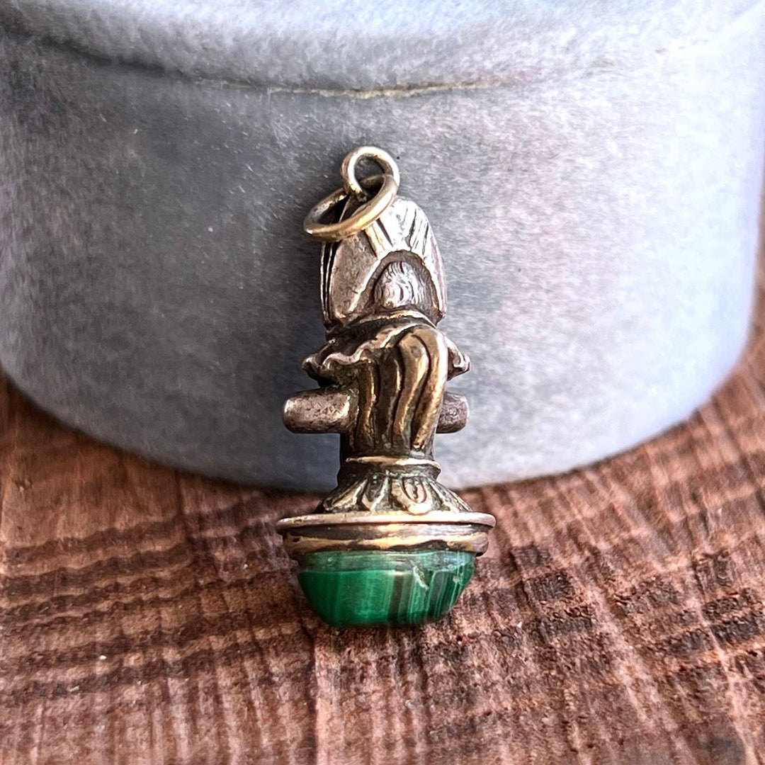 Silver puppet charm with polished malachite