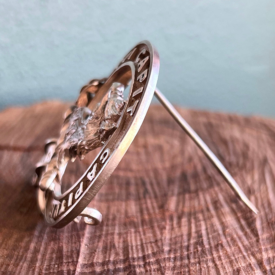 Antique British heraldic jewelry brooch