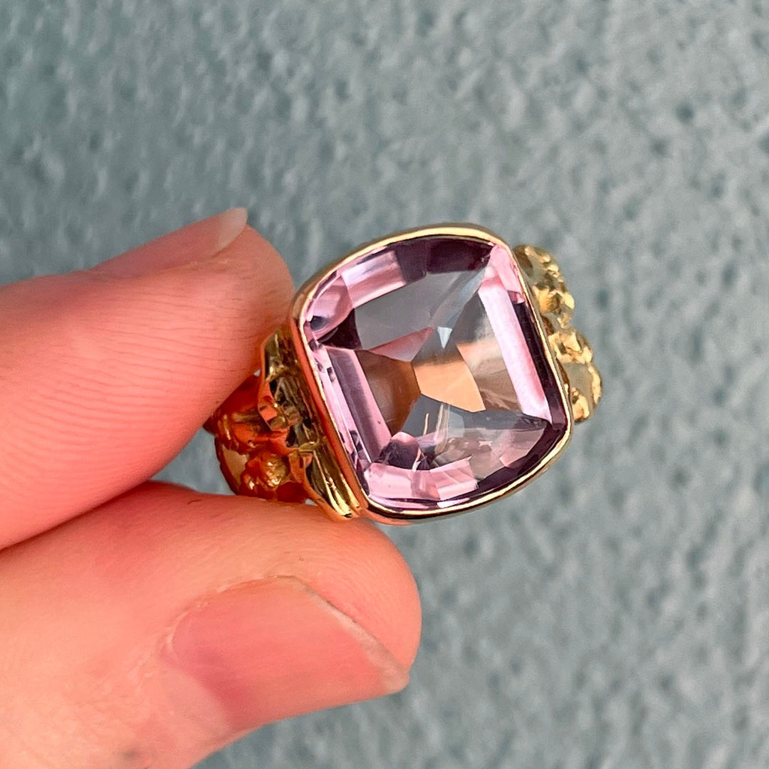 Detailed view of rectangular purple gemstone