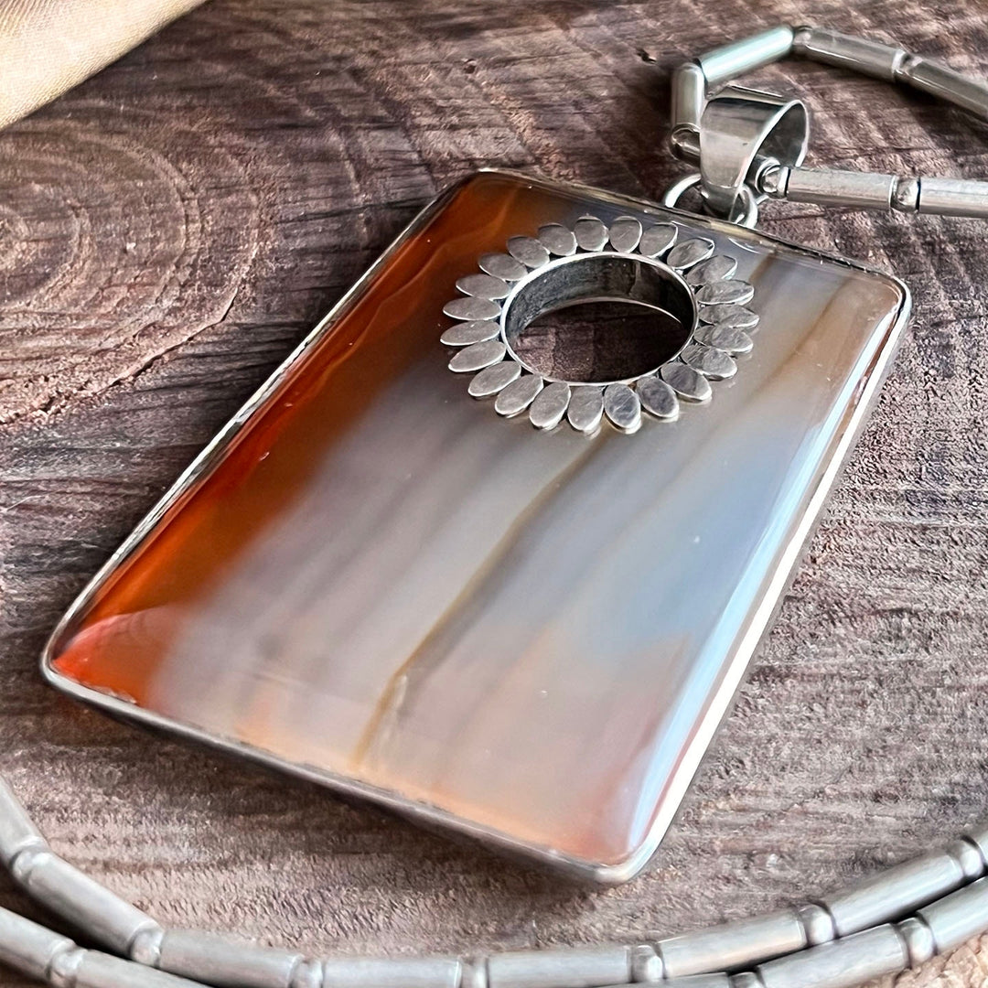 Side profile of sterling silver agate necklace