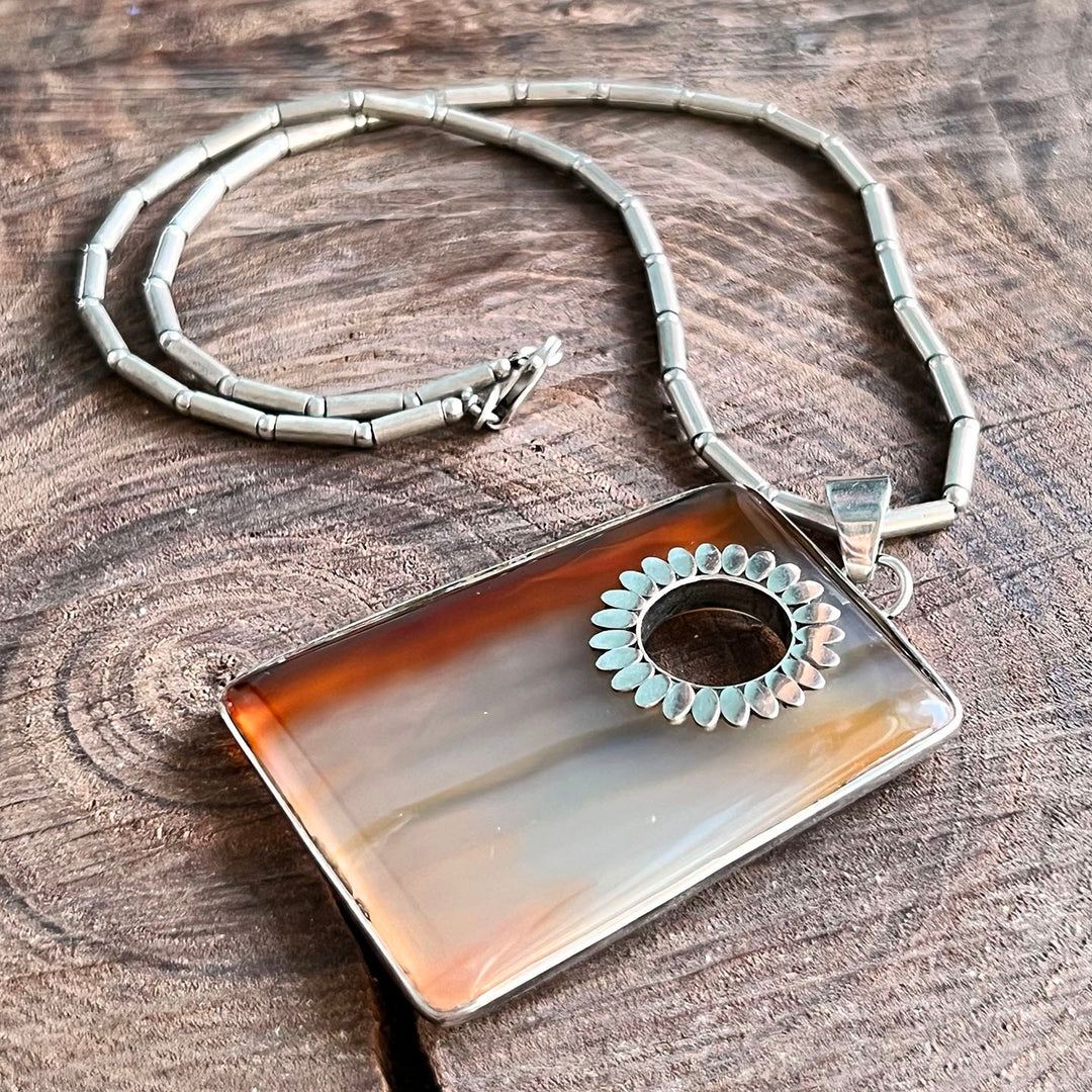 Side profile of sterling silver agate necklace