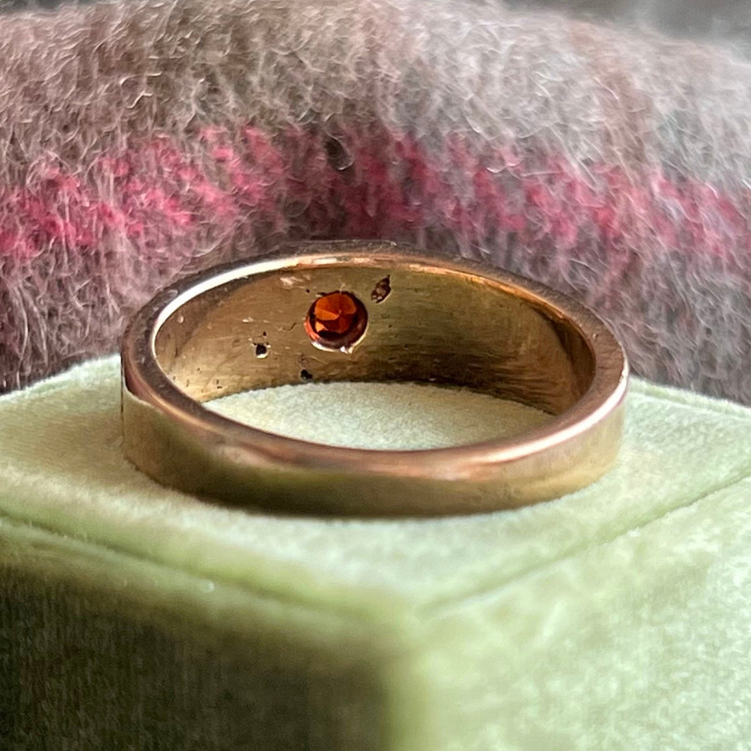 Estate Mizpah ring with red garnet and gold