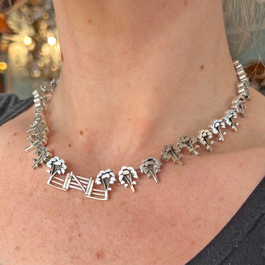 Silver collar necklace worn on neck statement vintage style