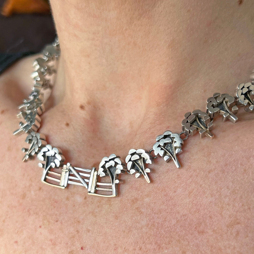 Silver collar necklace worn on neck statement vintage style