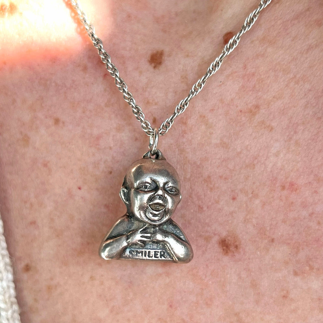 British advertising charm in sterling silver